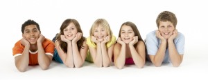 Group Of Five Young Children In Studio